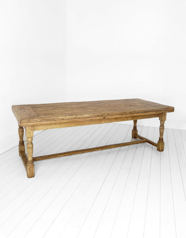 A substantial light oak English refectory table circa 1900.