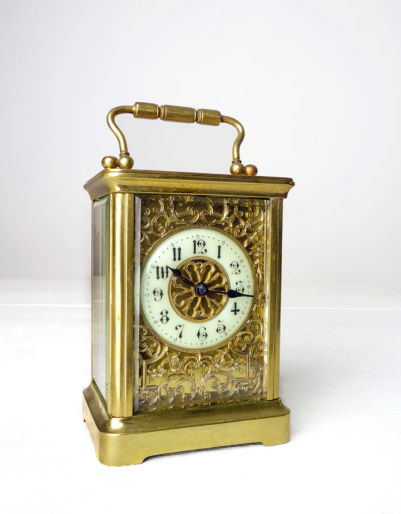 Small pretty carriage clock, French circa 1900 in a corniche case.