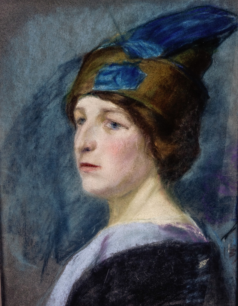 Antique potrait of lady with a hat.