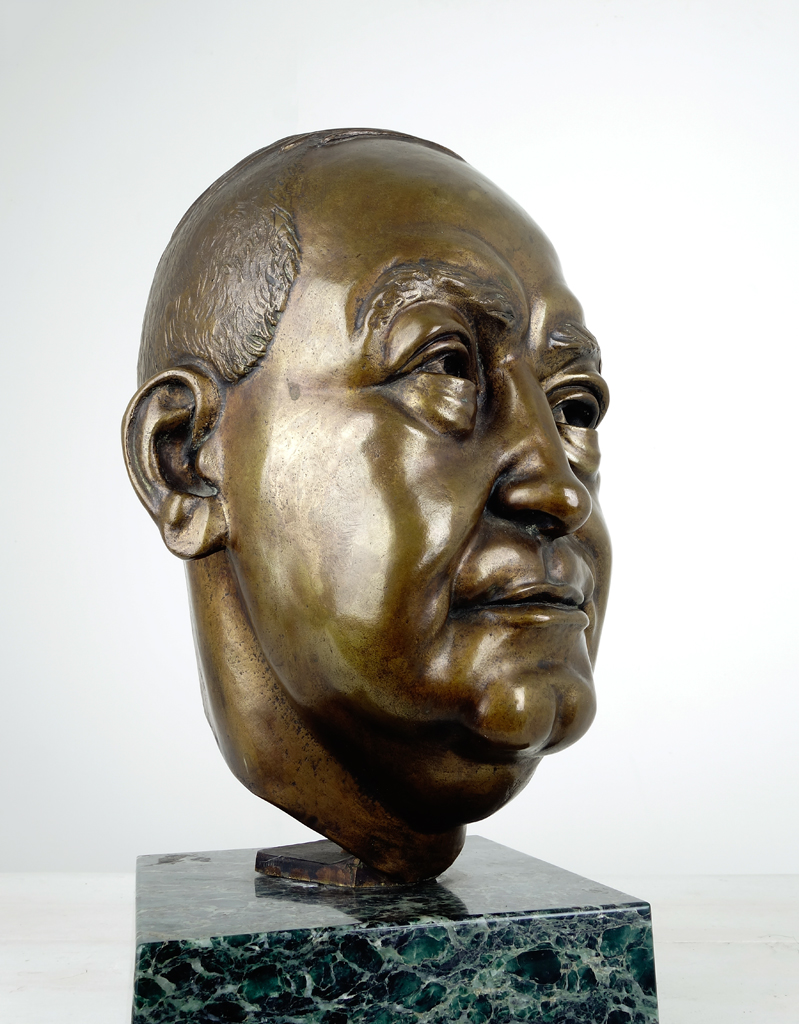 Life size signed bronze bust of a man by the female artist Sylvia Leibson.