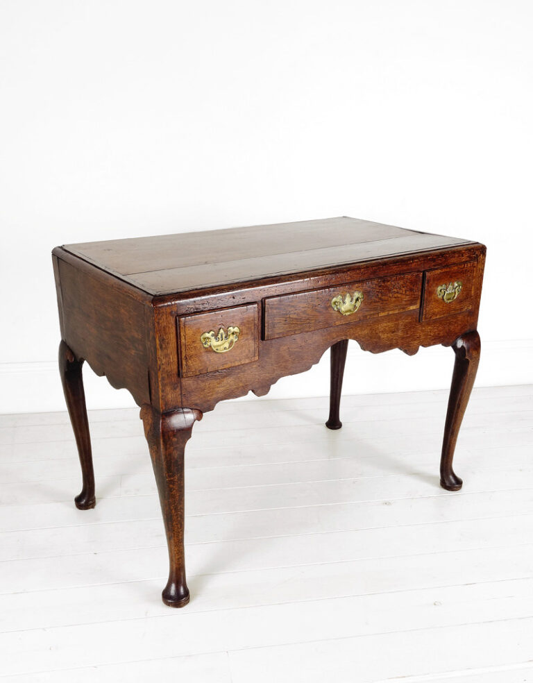 A large English oak lowboy c 1780.